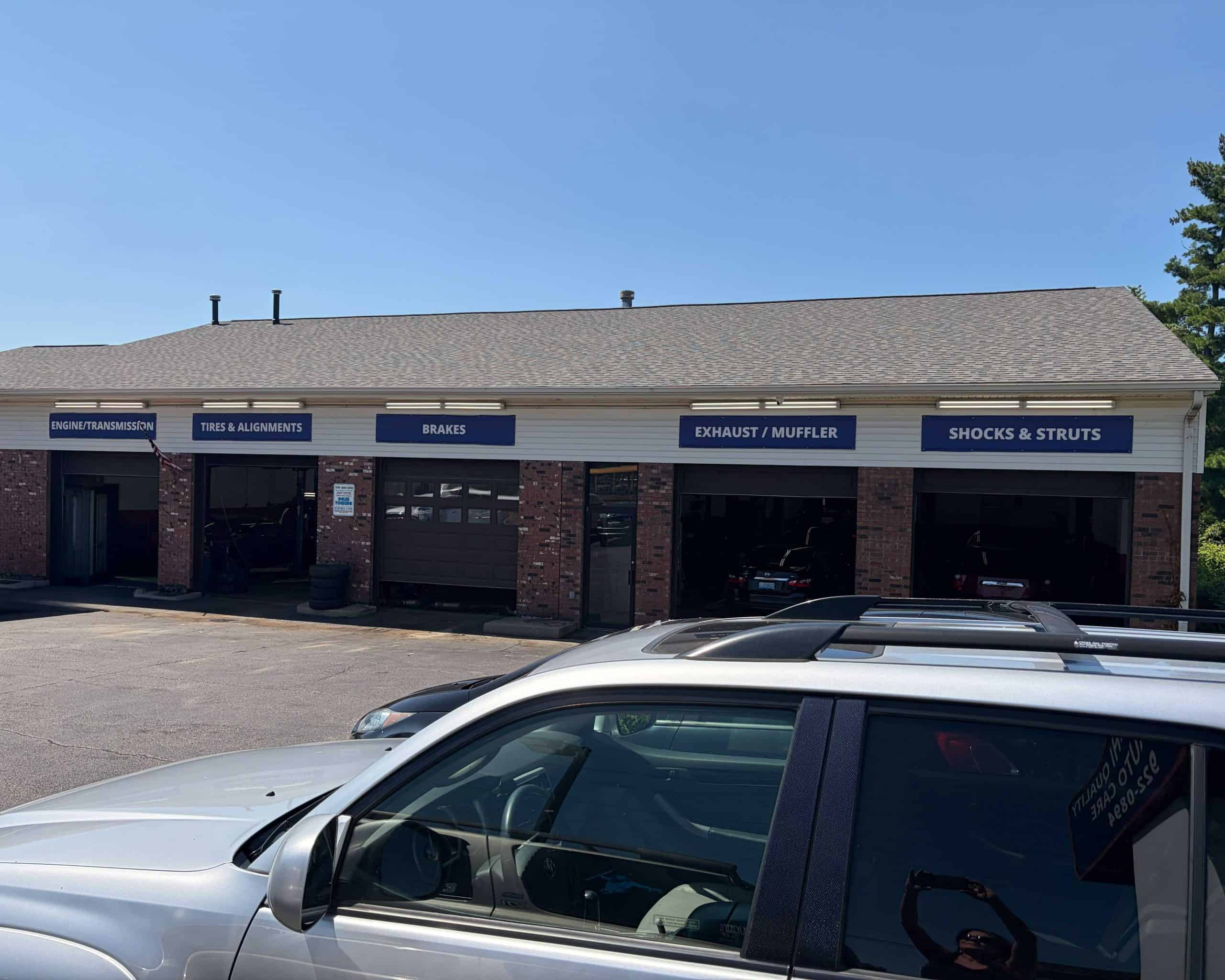 Auto repair shop with service bays for brakes, exhaust, shocks, and struts.